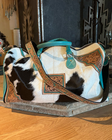 Cowhide and turquoise leather duffel